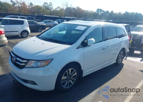 2014 Honda Odyssey Touring/Touring Elite z USA, uszkodzony, nr VIN 5FNRL5H99EB120936